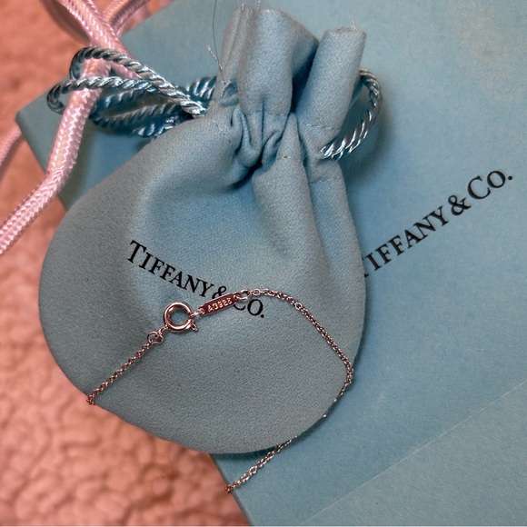 Authentic Tiffany & Co. Silver Heart Stamped Pendant and Key Necklace. - Picture 5 of 16